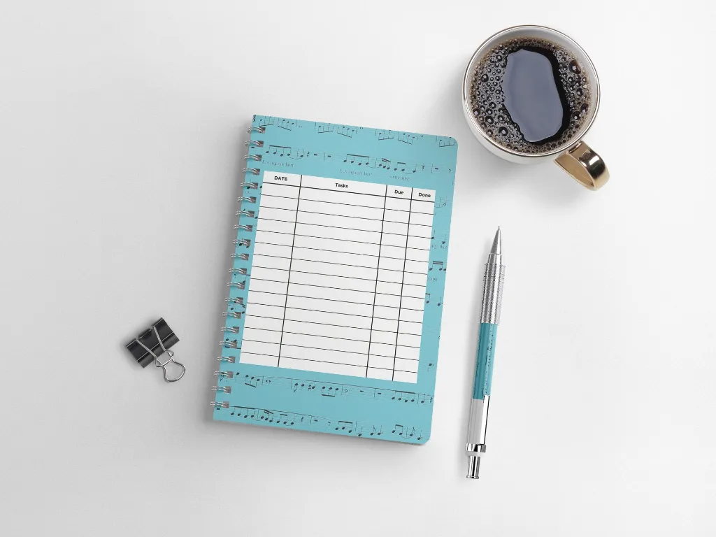 Free Spiral Notebook Mockup copy.webp